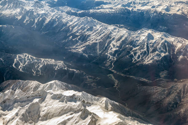istock Top view of the high mountain peaks covered with snow 1719956856