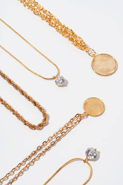 istock Set of gold chains with pendant on white background 1719990405