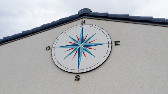 compass giant on the home wall facade house