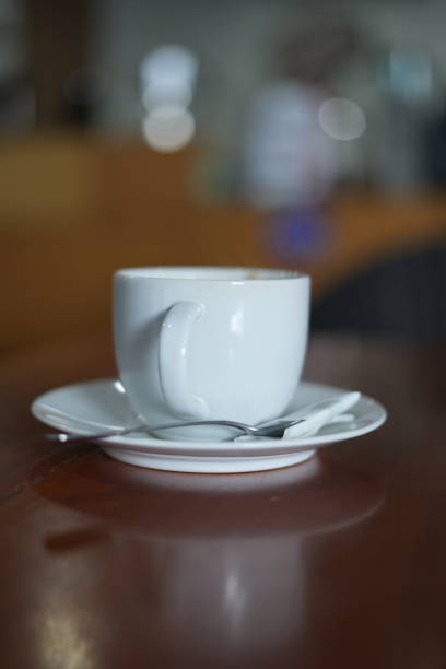 istock Coffee drink in a white glass placed on a cafe table 1719999061