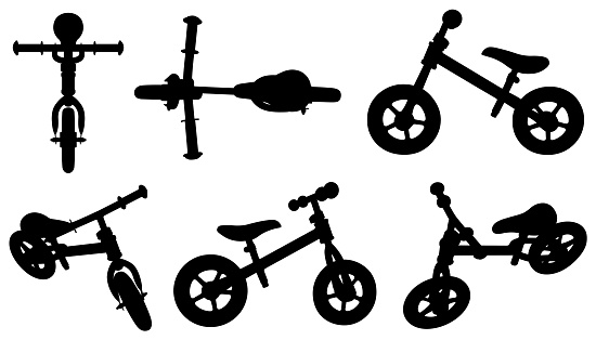 Set of different kids balance bike isolated on white