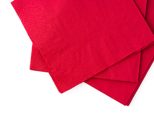 istock Stack of red paper napkins isolated on white background 1720003891