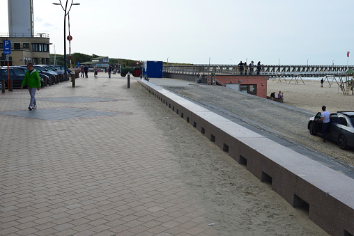 Blankenberge, West-Flanders, Belgium-September 30, 2023: new low boardwalk side railing build on the beach