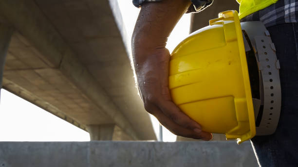 istock A foreman holding helmet on site Road construction For the development of modern transportation systems, Inspection project road construction development. 1720040411