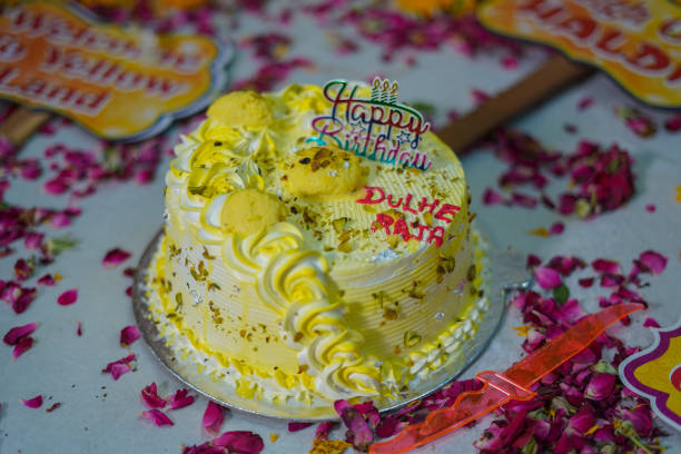 istock Round shaped delicious birthday cake with mango icing for birthday, Wedding Anniversary 1720041538