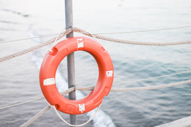 istock A life jacket hangs on the beach. Orange life jacket 1720066537