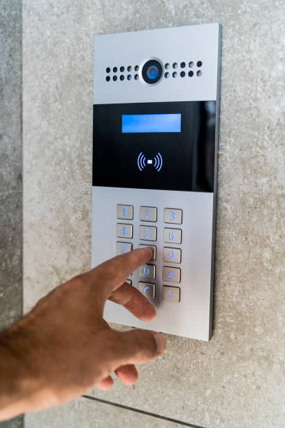 istock Intercom on door house. Electronic key and video call for entry. 1720067652