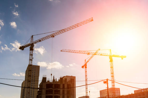 istock Construction industry building. Construction industry site with cranes, fittings and concrete. 1720069374