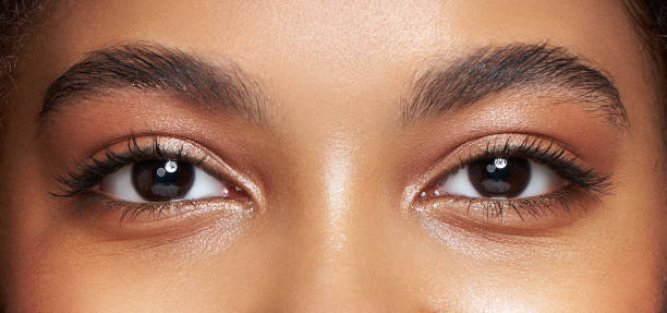 istock Beautiful female eyes with long eyelashes 1720081984