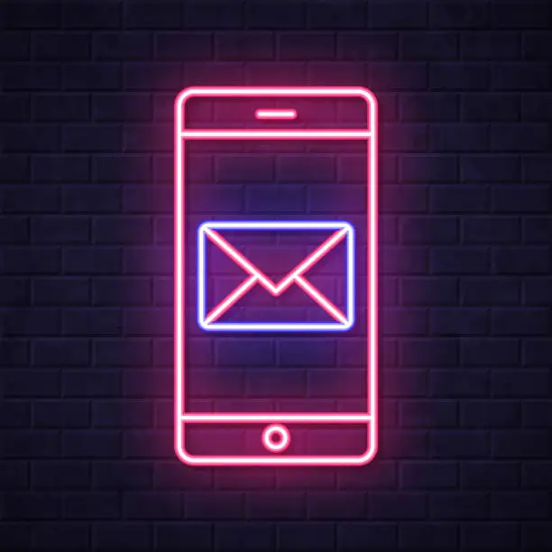 Vector illustration of Smartphone with email message. Glowing neon icon on brick wall background