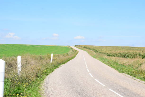 istock curvy country road up the hill 1720131388