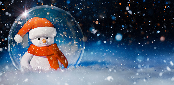 Snow Ball with Snowman inside it with Magic Snow Background