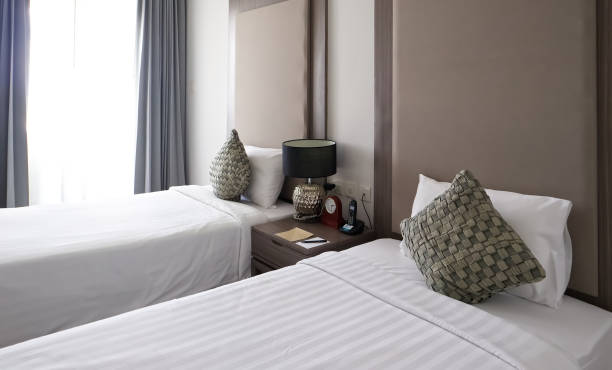 istock Interior of luxury double beds in bedroom, home background 1720199743