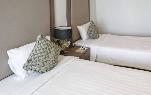 istock Interior of luxury double beds in bedroom, home background 1720199746