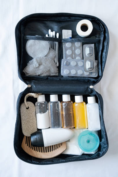istock Travel cosmetics kit on bed , top view 1720201882
