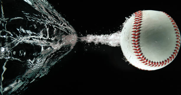 istock Baseball's Ball Falling into Water against White background 1720250557