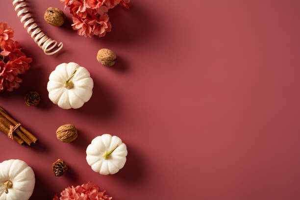 istock Thanksgiving decorative pumpkins with autumn fall decor on brown background. Flat lay, top view, copy space. 1720261365