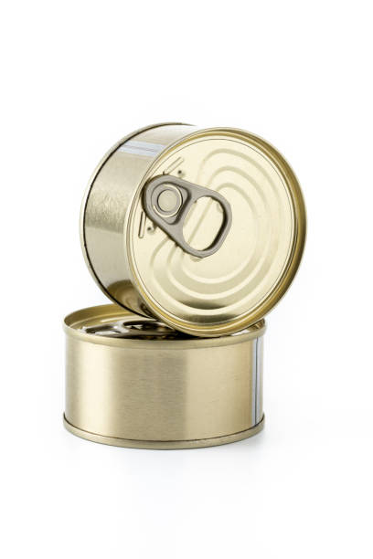 Various canned food in metal cans isolated on white background