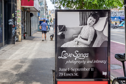 Essex Street, Manhattan, New York, USA - August 17th 2023:  Poster with a portrait of Nobuyoshi Araki's wife outside the International Center of Photography