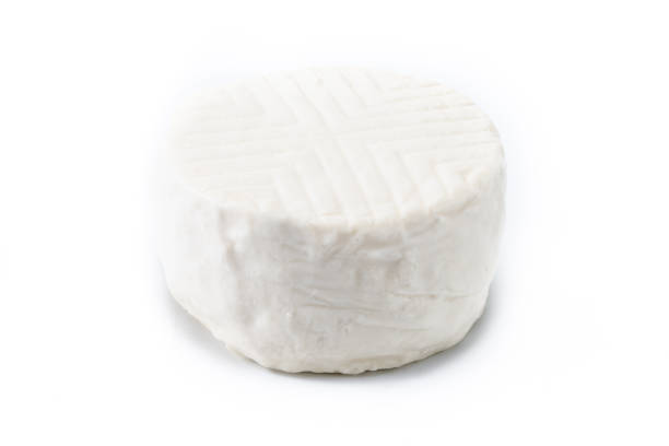 istock Sliced fresh white cheese from cow's milk isolated on white background 1720332652
