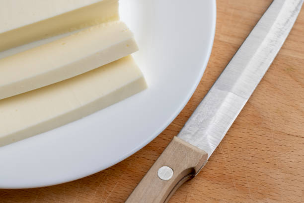 istock Sliced cream cheese for salads 1720353463