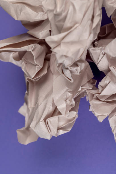 istock gray low-quality crumpled paper from recycled waste paper 1720353910