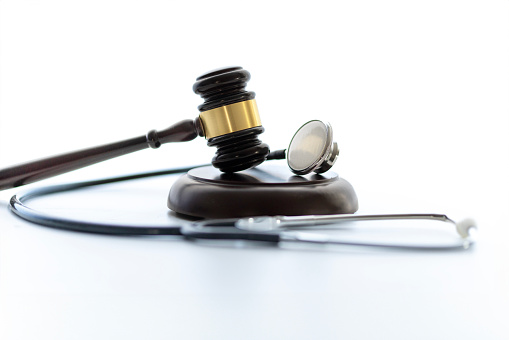 Judge gavel and stethoscope. Medical jurisprudence. Medical malpractice, lawyer