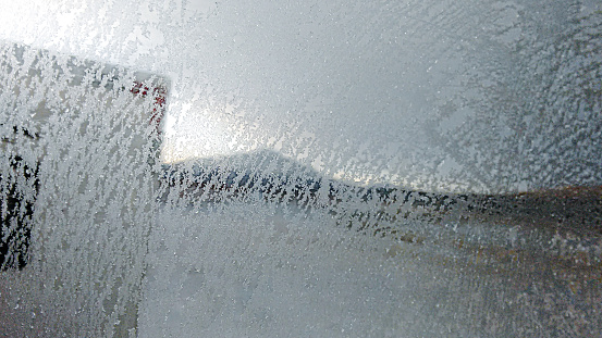 Frozen dew on a glass window.