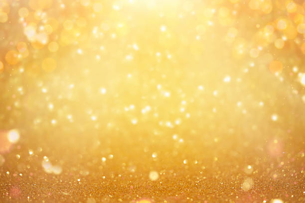 istock Defocused shining yellow bokeh background. Christmas texture. 1720439079