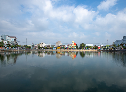 Go Cong town reflected by the Racetrack pond, Tien Giang province