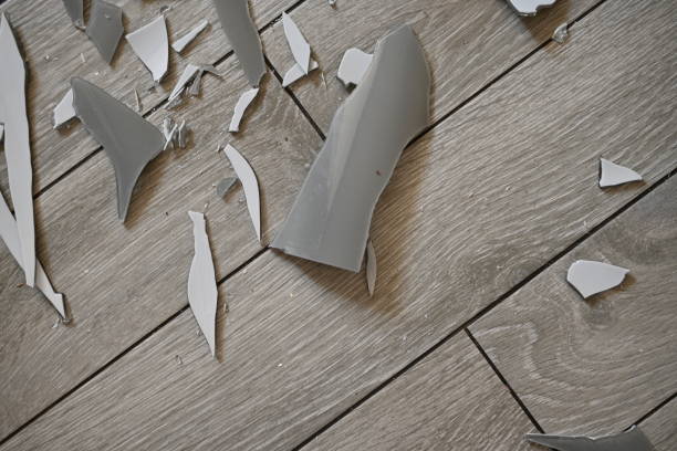 istock glass shards on the floor as a backdrop, broken dishes grey as a backdrop. 1720497892