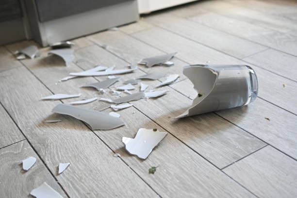 istock broken vase on the kitchen floor, gray broken vase, vase shards on the floor 1720500742