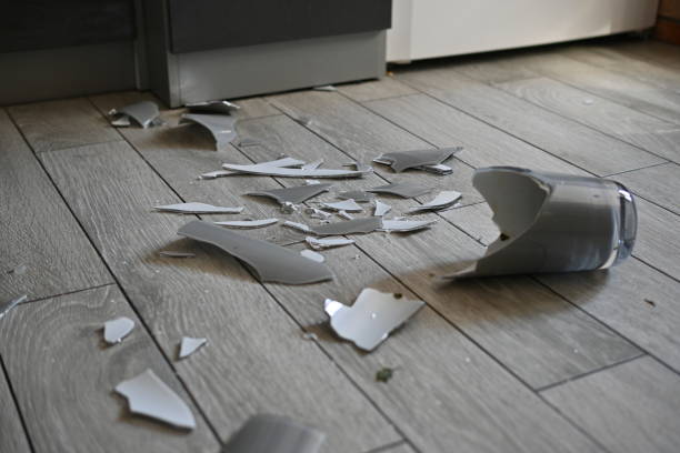 istock broken vase on the kitchen floor, gray broken vase, vase shards on the floor 1720501383