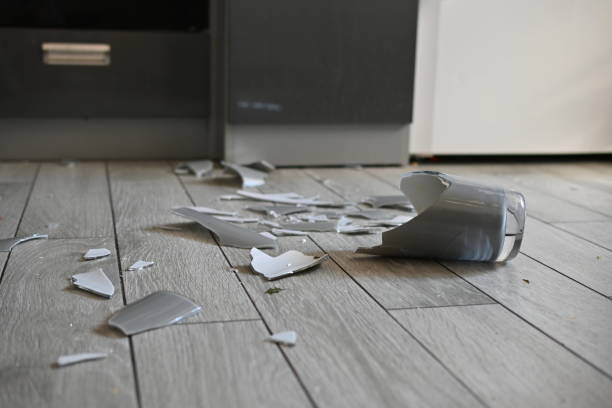 istock broken vase on the kitchen floor, gray broken vase, vase shards on the floor 1720501471