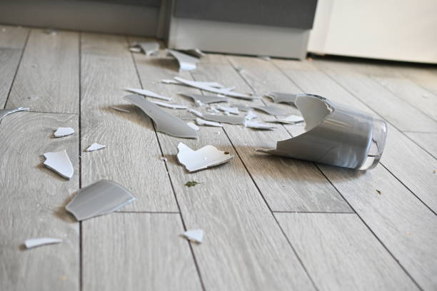 istock broken vase on the kitchen floor, gray broken vase, vase shards on the floor 1720501931