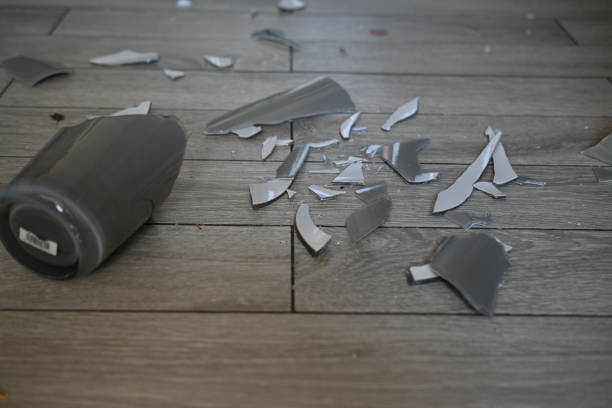 istock broken glassware on the floor, the consequences of a quarrel smashed glassware on the gray floor 1720501962