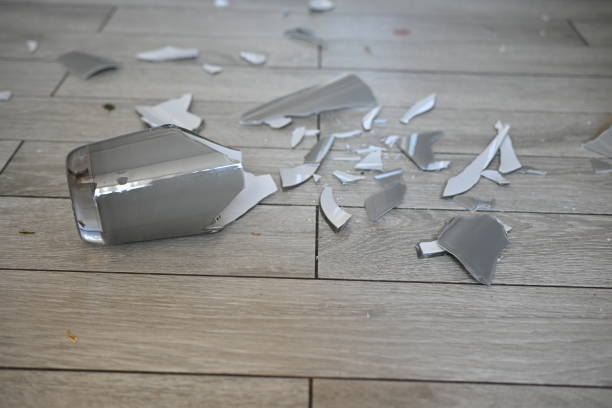 istock broken glassware on the floor, the consequences of a quarrel smashed glassware on the gray floor 1720501975