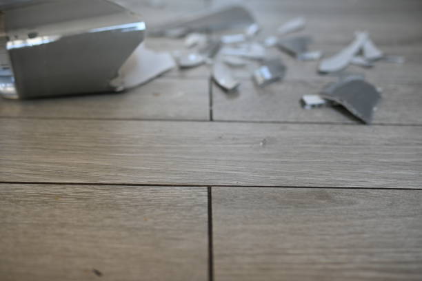 istock broken glassware on the floor, the consequences of a quarrel smashed glassware on the gray floor 1720502515