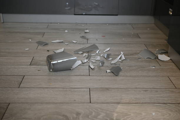istock broken glassware on the floor, the consequences of a quarrel smashed glassware on the gray floor 1720502551