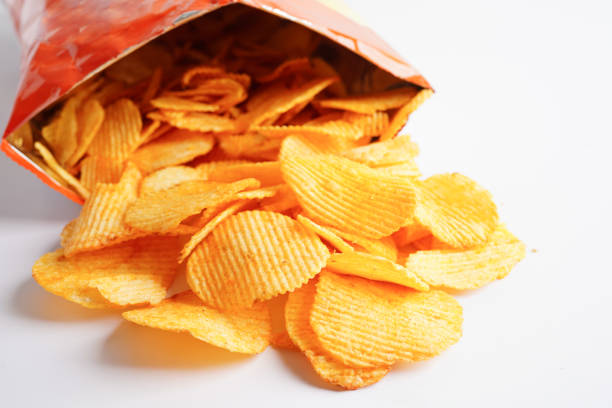 istock Potato chips in open bag, delicious BBQ seasoning spicy for crips, thin slice deep fried snack fast food. 1720514602