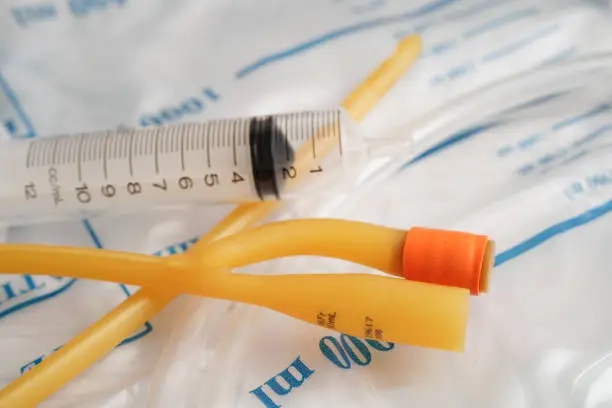 Foley catheter and urine drainage bag collect urine for disability or patient in hospital.