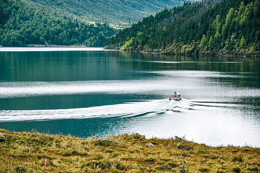 Boat sailing in the alpine lakes scenic area.