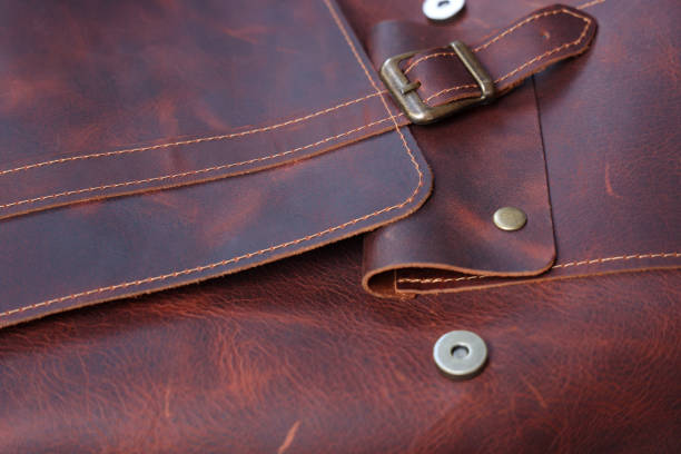 istock Brown leather bag texture background, genuine leather 1720563975