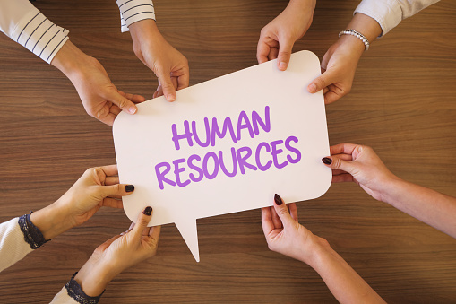 Women holding speech bubble with Human Resources text