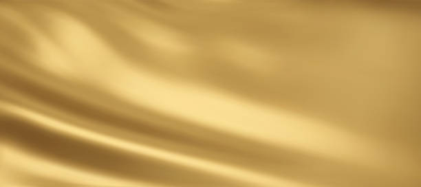 istock Close-up texture of natural gold silk. Light Golden fabric smooth texture surface background. Smooth elegant gold silk in Sepia toned. Texture, background, pattern, template. 1720586003