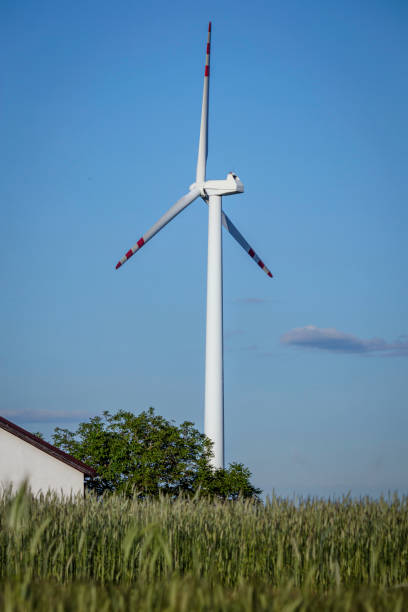 istock wind power plant wind turbine save planet, green energy 1720602339