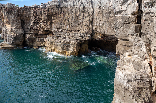 View of Boca De Inferno grotto in the Atlantic Ocean. Cascais, Portugal. The seascape.