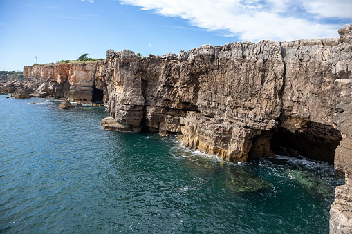 Seascape. View of the cliffs Boca De Inferno by the ocean in Cascais, Portugal.