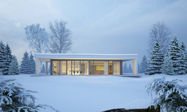 istock Modern cubic villa in winter in the evening 1720607460
