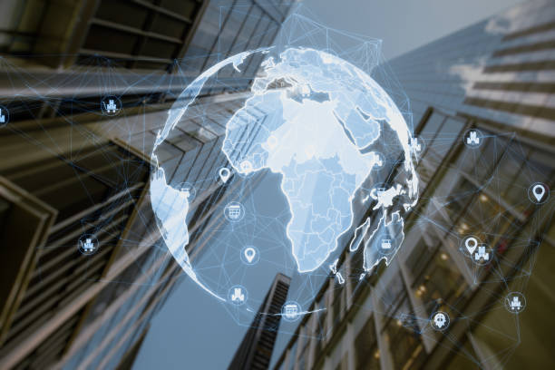 istock Creative glowing polygonal globe hologram with icons on blurry city background. Global technology and internet concept. Double exposure. 1720629220